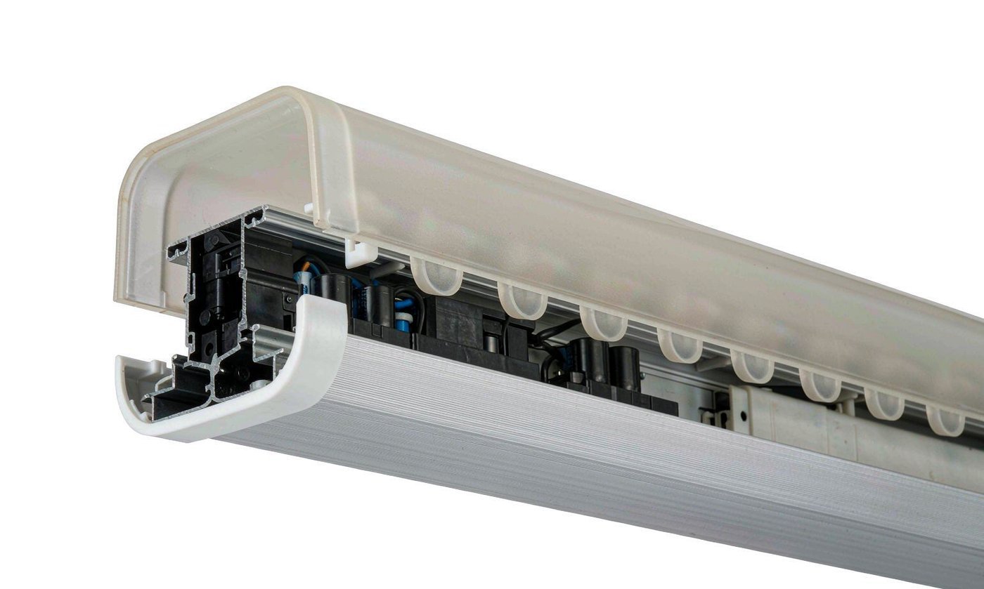 Linear LED luminaire cutaway showing an extruded diffuser snapped into the aluminium housing channel